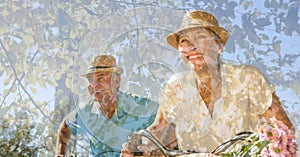 Composition of senior couple cycling, smiling and trees in sunlight