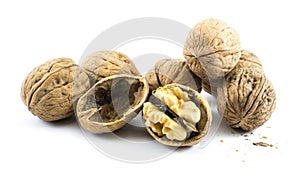 Composition of seven walnuts on a white background