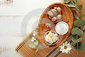 Composition with shea butter on table