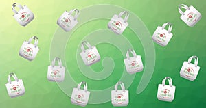 Composition of shopping bags with anti plastic text and globe logos repeated over green background