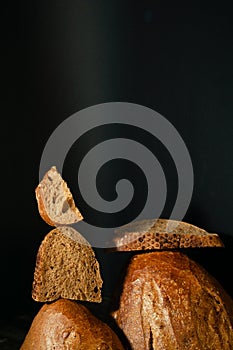 Composition with slices of fresh bread. Crispy golden baking crust and fragrant crumb