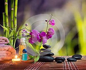 Composition spa massage - bamboo - orchid, towels, candles and black stones