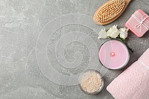 Composition with spa supplies on grey background