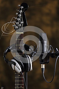 Microphone, earphones and electric guitar
