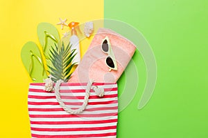 Composition with stylish beach accessories on colored background, top view. Beach fashion flat lay, summer concept