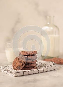 Composition on the table of milk and cookies