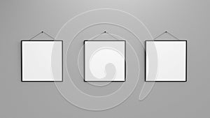 Composition of three blank photo frames on grey wall 3d black and white