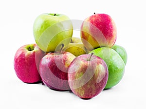 Composition of three types of apples on a white background - green, yellow and red - still life