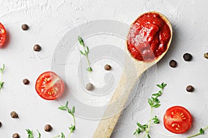 composition of tomato sauce and allspice, Thyme spread on marble