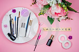 Composition of tools for eyelash extensions, inscription Lashmaker