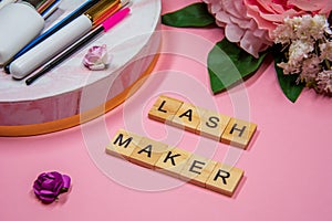 Composition of tools for eyelash extensions, inscription Lashmaker