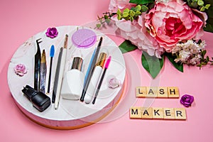 Composition of tools for eyelash extensions, inscription Lashmaker