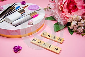 Composition of tools for eyelash extensions, inscription Lashmaker