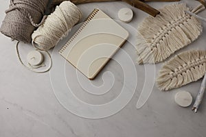 Composition with tools and materials for macrame