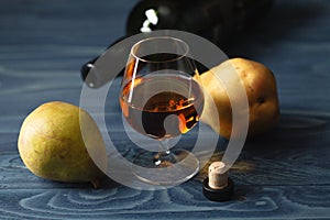Composition with traditional fruit brandy and pears
