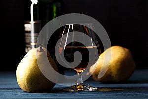 Composition with traditional fruit brandy and pears