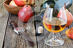 Composition with traditional fruit brandy and pears