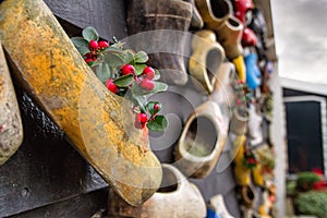 Composition on the wall from traditional dutch wooden shoes - klompen clogs