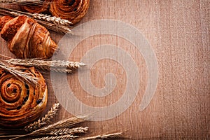 Composition of wheat ears bakery products on oaken