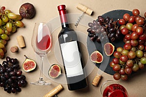 Composition wine and fruits on craft background, top view