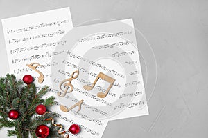 Composition with wooden music notes on grey background