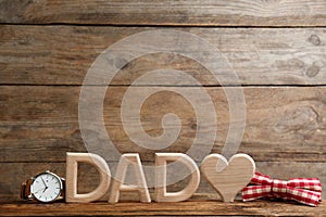 Composition with word DAD and heart on background, space for text. Happy Father`s day