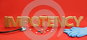 Composition with word IMPOTENCY on red background