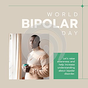 Composition of world bipolar day text over afican american man