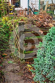 Composter bin in garden - recycling of garden and kitchen waste