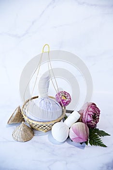 Compress ball, spa massage,Herbal Compress Ball with, Lotus Flower - Beauty Concept, spa theme object on white background