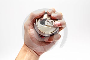 Compressed beer can in hand