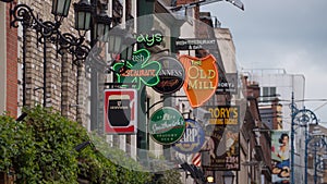 Irish pub signs outside pubs in Temple bar, Dublin, Ireland.