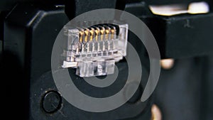 Compression of the Internet connector using a crimper for crimping RJ 45. Internet Network Connector, rj45.Crimping of a unified