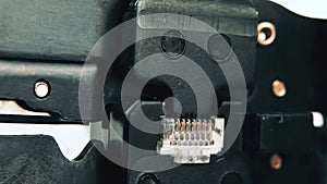 Compression of the Internet connector using a crimper for crimping RJ 45. Internet Network Connector, rj45.Crimping of a unified c