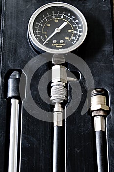 Compressometer in box close up