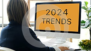 Computer with 2024 trends on screen background, digital marketing, business and technology concept
