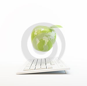 Computer and an apple with the world map