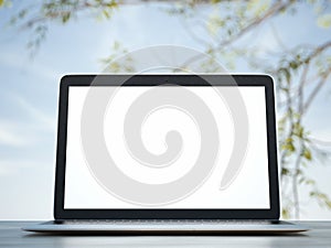 Computer on a background of blue sky