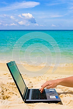 Computer on beach