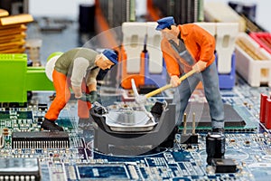Computer board and construction workers
