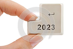 Computer button 2023 in hand