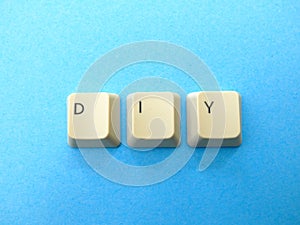 Computer buttons form a DYI Do it yourself abbreviation. Computer and internet slang