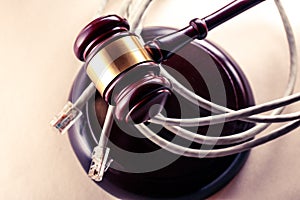 Computer cable and wooden gavel