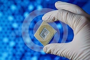 Computer chip in hands. A chipset is a set of electronic component that is integrated and flows data between the processor.