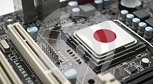 Computer chip on PCB board with Japan flag. CPU Central processing Unit or GPU microchip on a motherboard