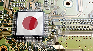 Computer chip on PCB board with Japan flag. CPU Central processing Unit or GPU microchip on a motherboard