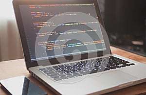 Computer code on laptop (web developing