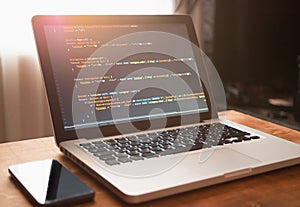 Computer code on laptop web developing and cellphone
