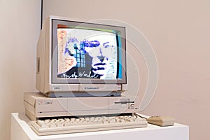 Computer Commodore Amiga 1000 with floppy disk and mouse