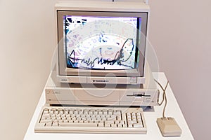Computer Commodore Amiga 1000 with floppy disk and mouse